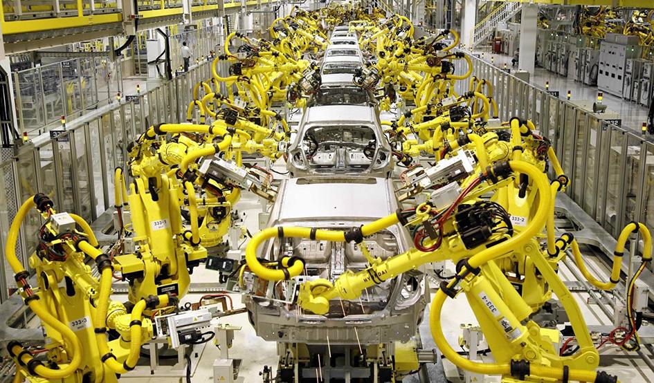 Larger robots at car factory