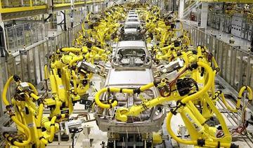 Small robots at car factory